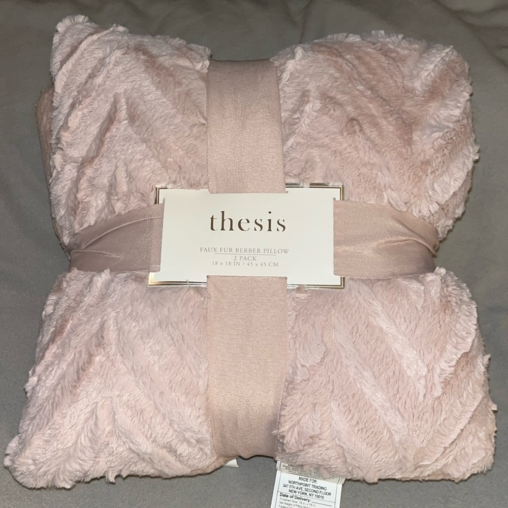 NWT.  Faux fur Berber pillow twin pack